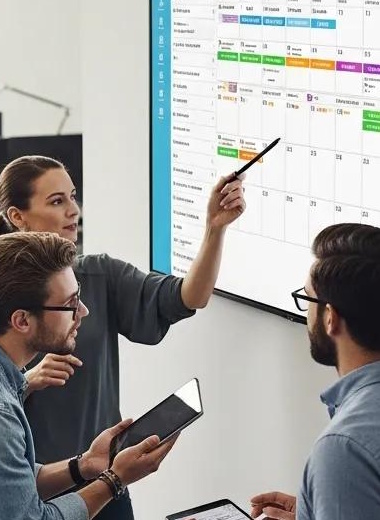 diverse employees collaborating on workforce scheduling in a modern office a317d9b6 dee4 4fcf ac20 2ab368abe3c7ww